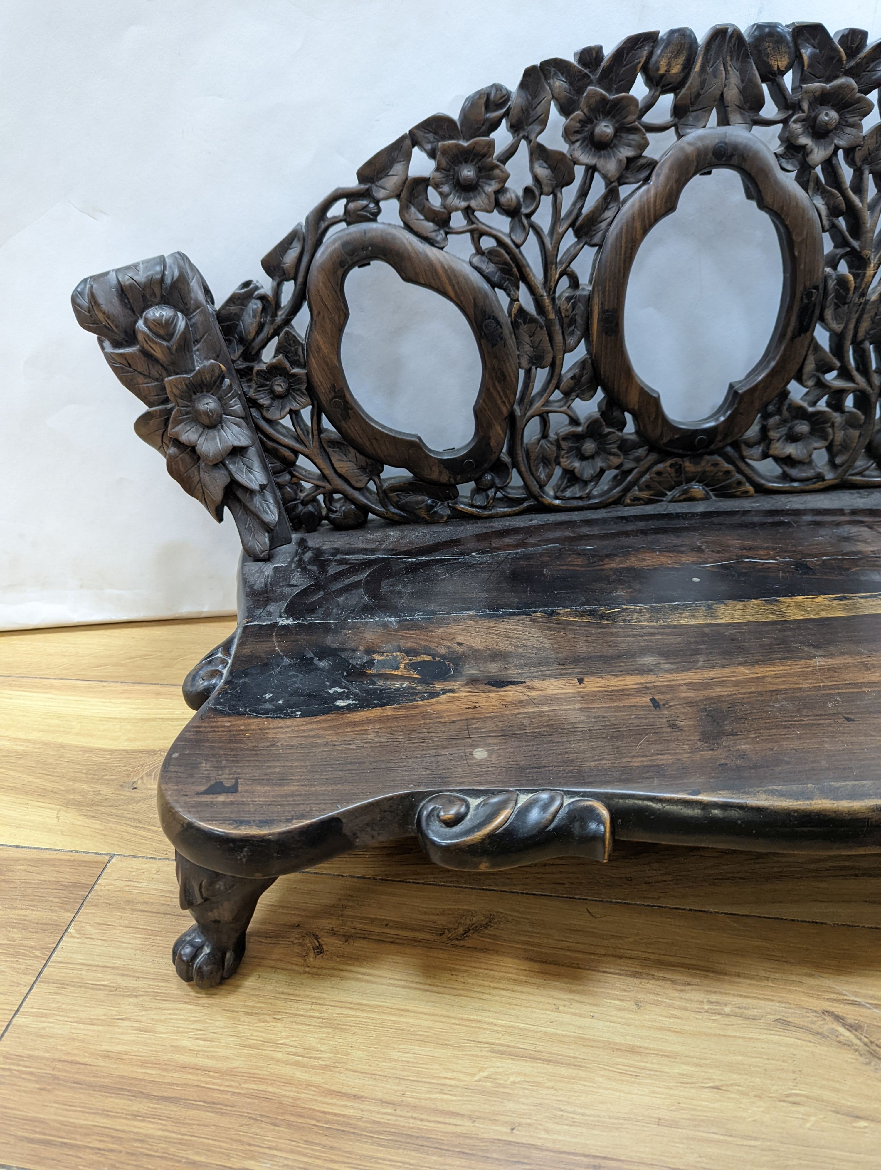 An early 20th century Chinese carved hardwood stand 85cm wide